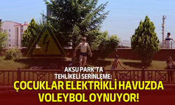Aksu Park'ta Tehlikeli Serinleme: Çocuklar Elektrikli Havuzda Voleybol Oynuyor!
